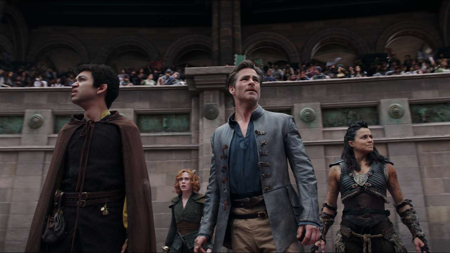 Justice Smith plays Simon, Sophia Lillis plays Doric, Chris Pine plays Edgin and Michelle Rodriguez plays Holga in Dungeons & Dragons: Honor Among Thieves