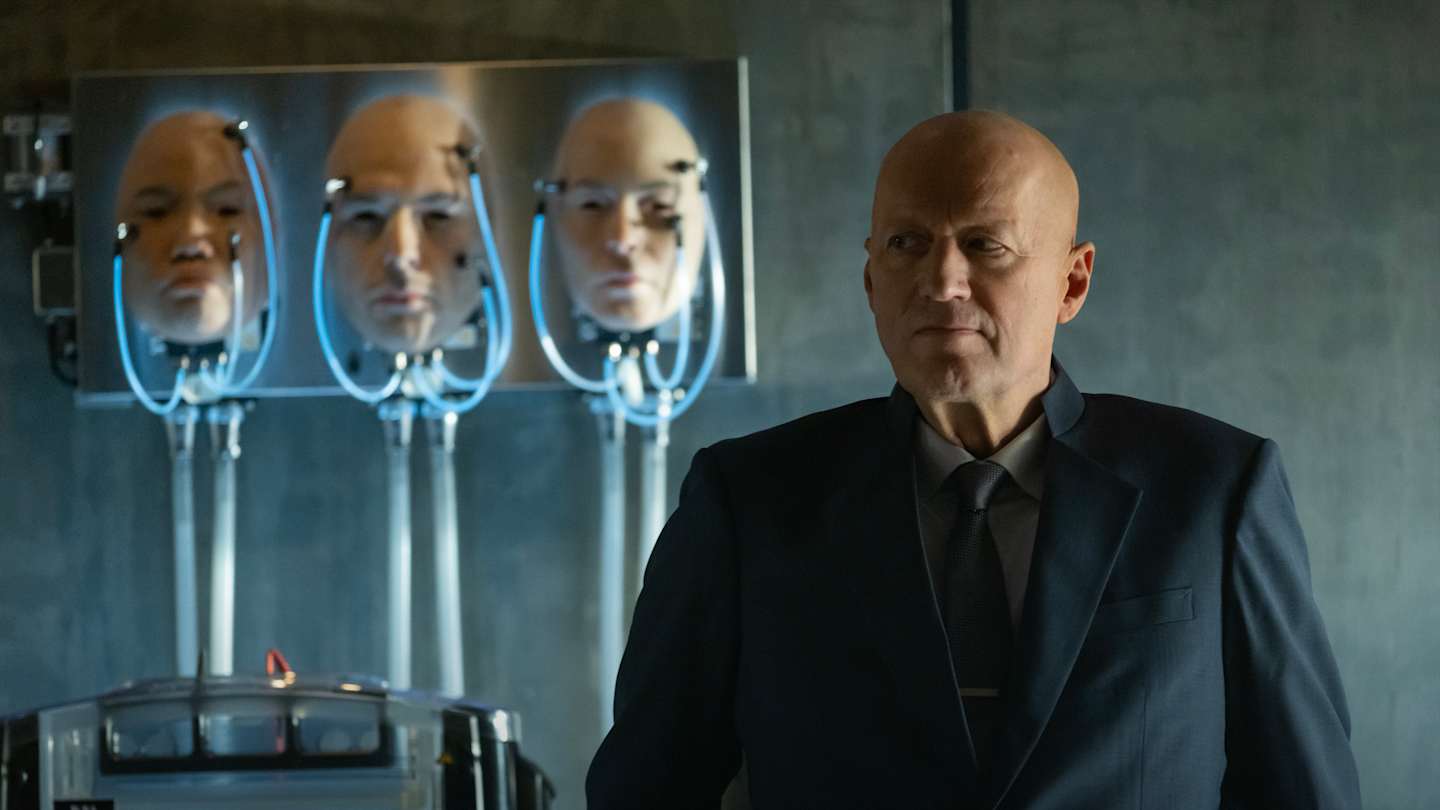 Ade Edmondson as Atom Eins in Alien: Earth